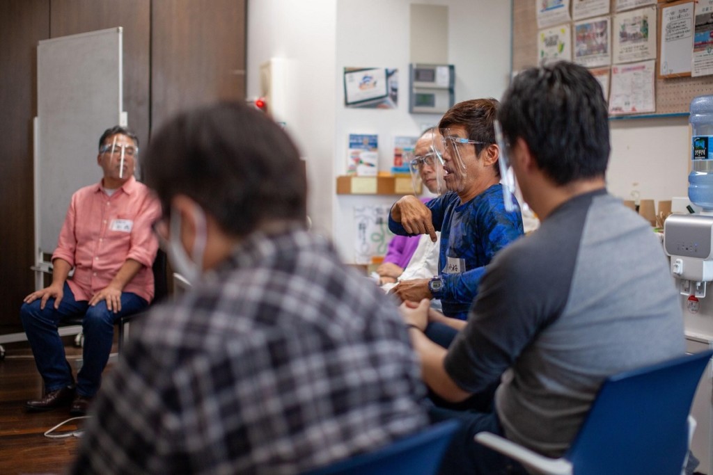 MimiKoko Cafe Photo of everyone talking in sign language