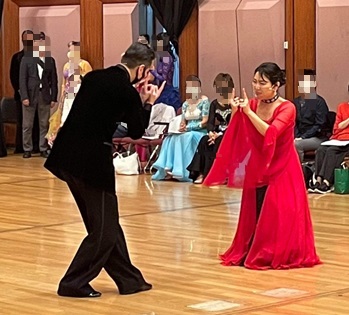 Photo of ballroom dancing with sign language